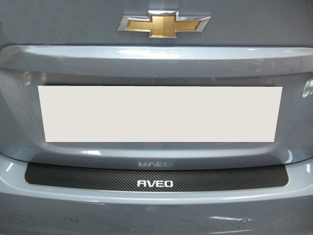 Накладка на бампер Chevrolet Aveo '2011-> (прямая, седан, исполнение Premium+карбоновая пленка) NataNiko