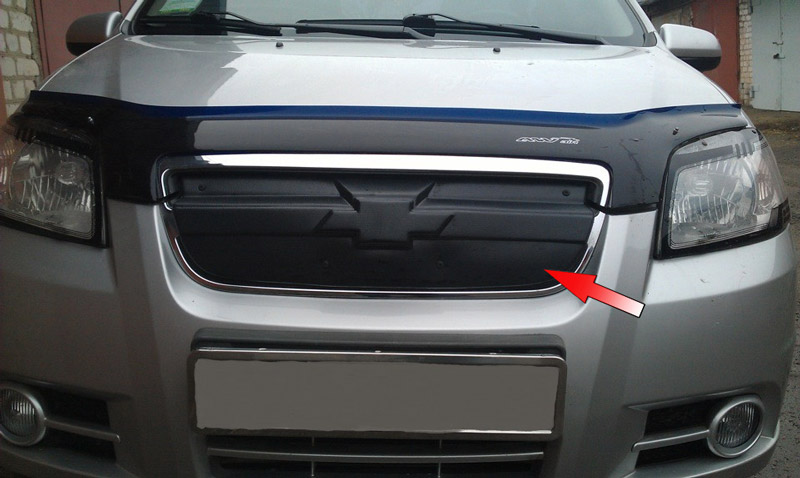 Зимняя накладка на решетку радиатора для Chevrolet Aveo '2006-2011 (верхняя решетка, седан) матовая FLY